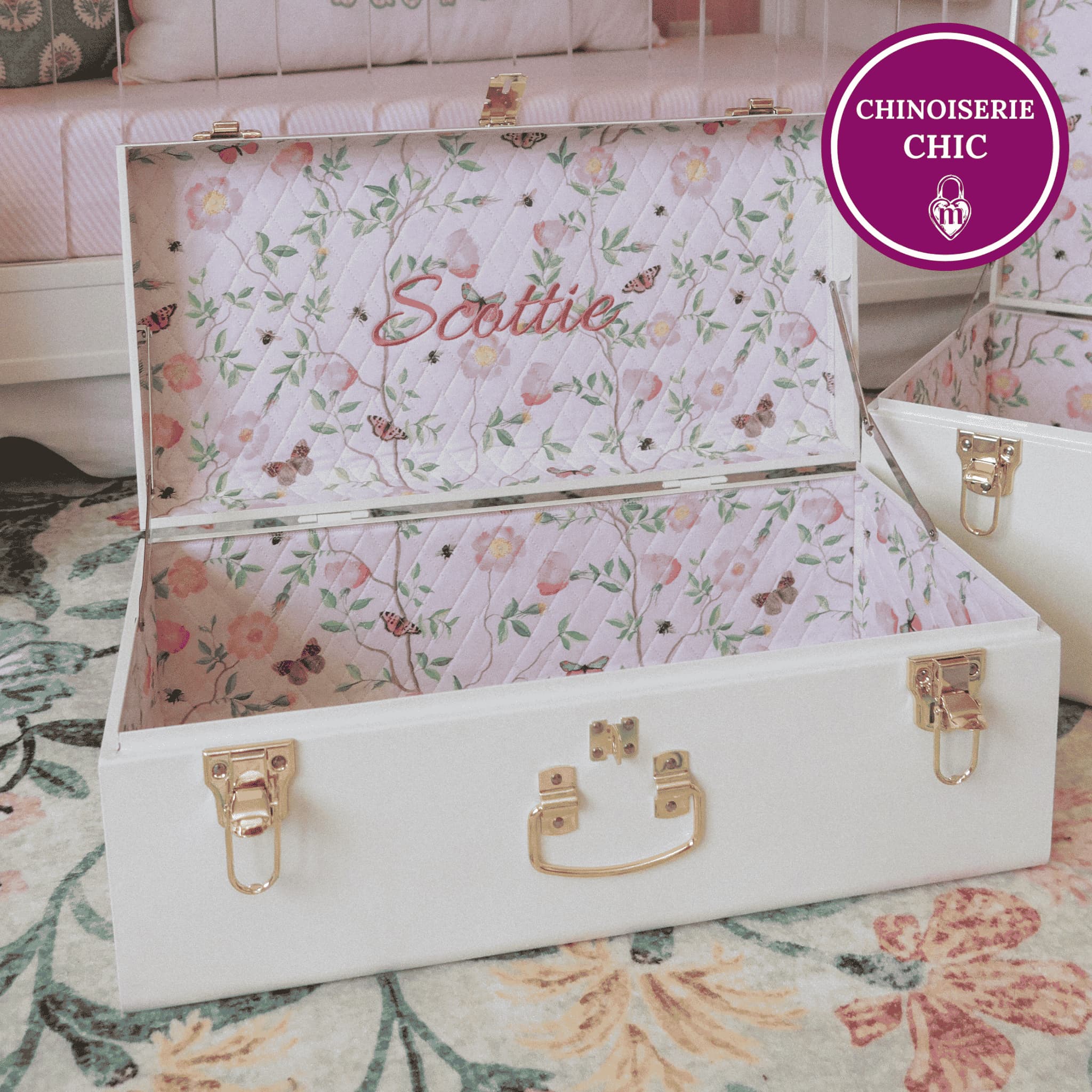 Floral-patterned jewelry box with 'Scottie' embroidered on it, branded 'Chinoiserie Chic'.